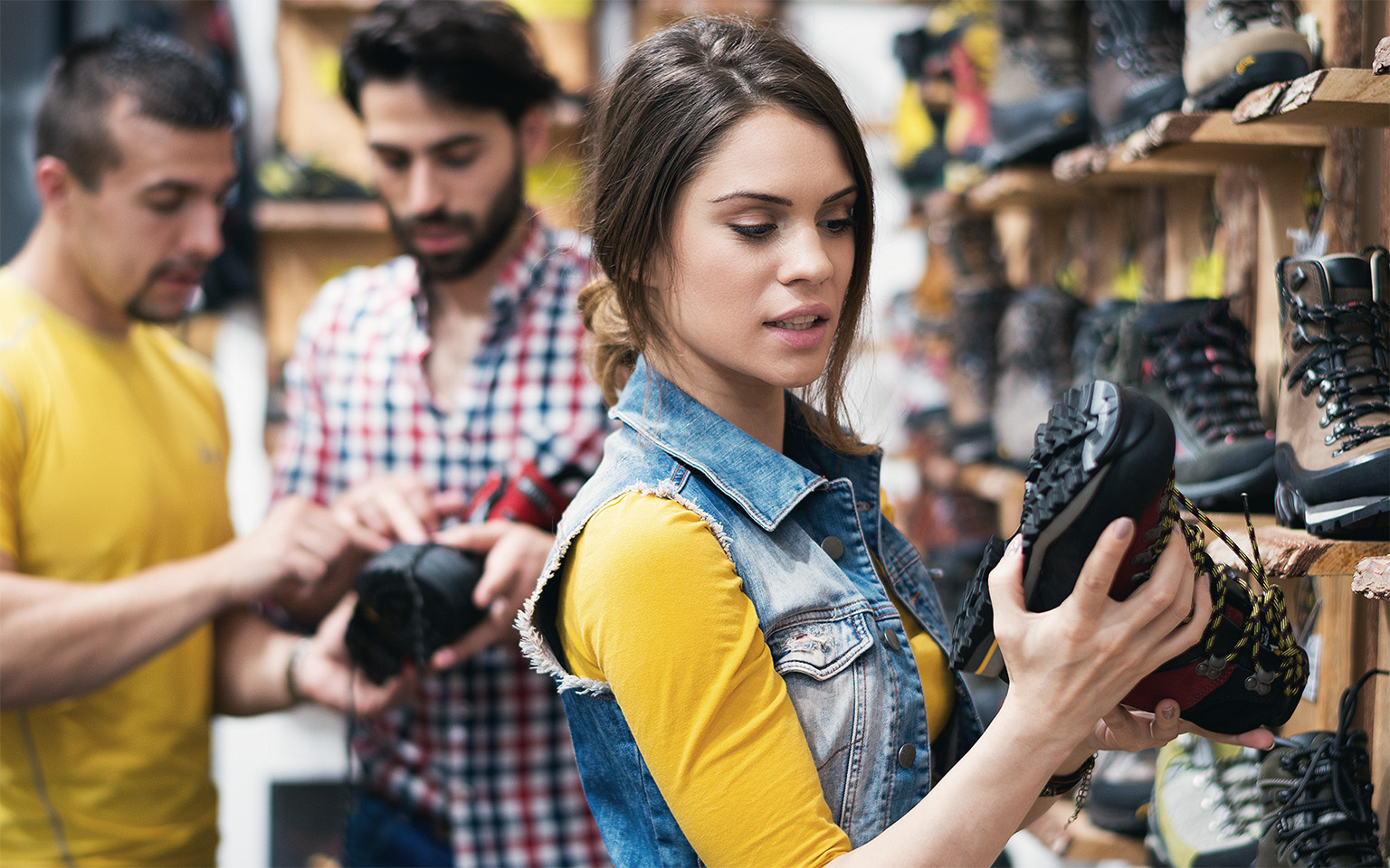 Female checking seal of approval for hiking boots