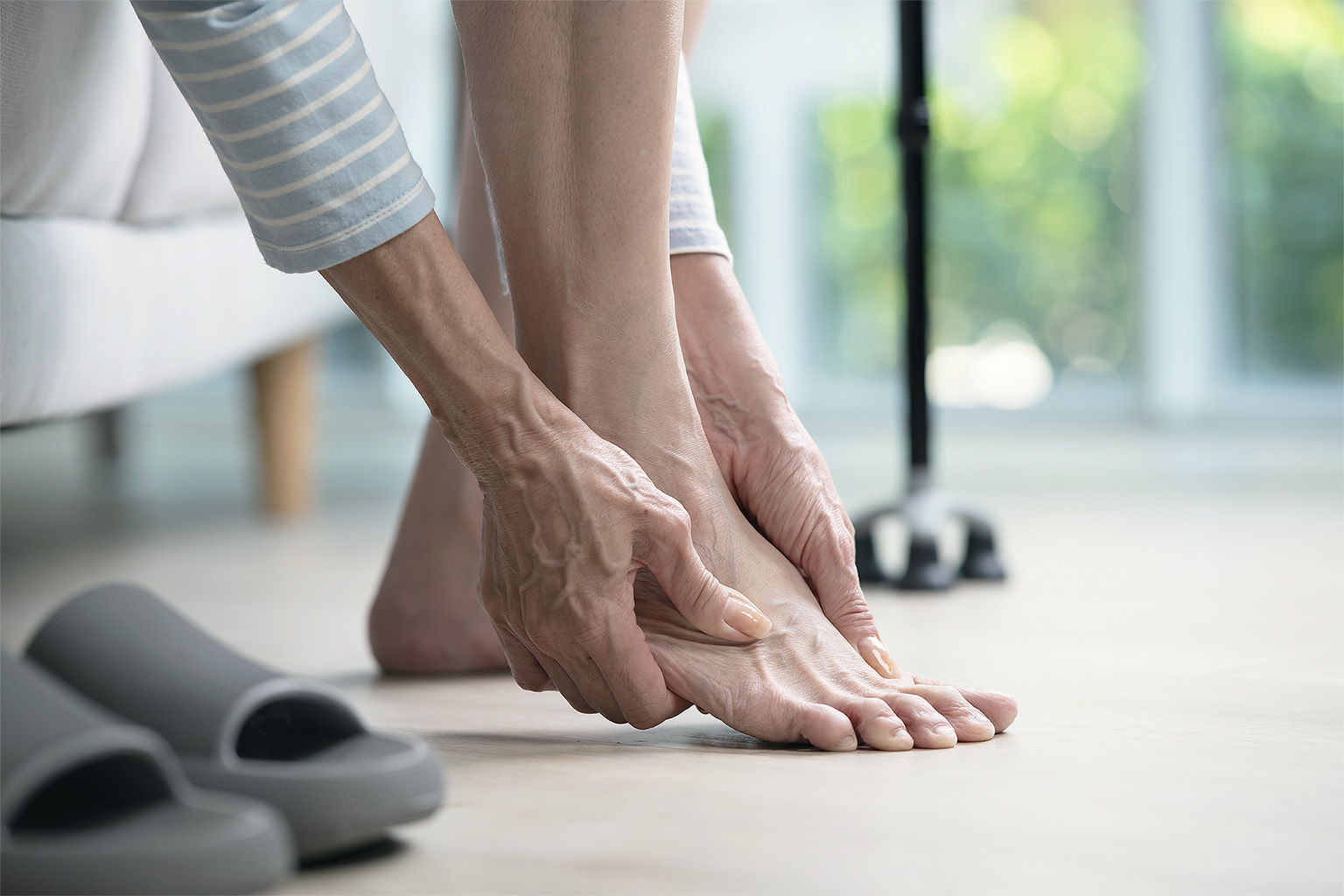 Senior woman with ankle pain