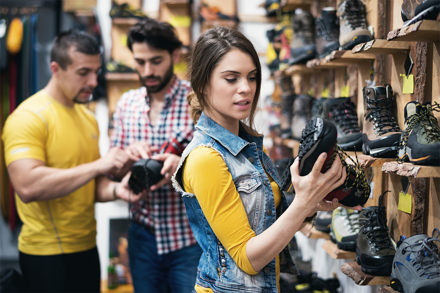 Couple choosing hiking boots