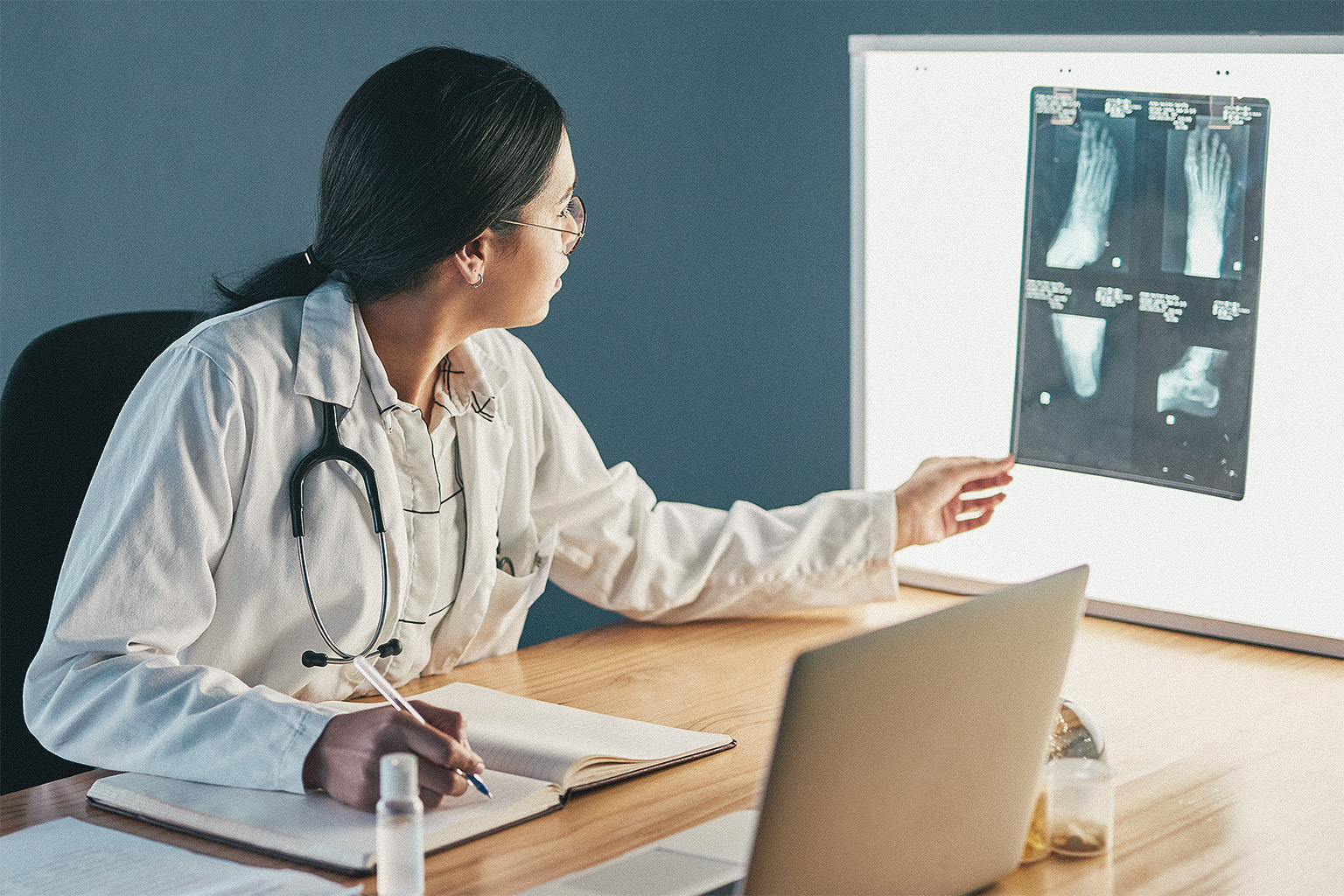 Doctor analysing an X-ray in a hospital