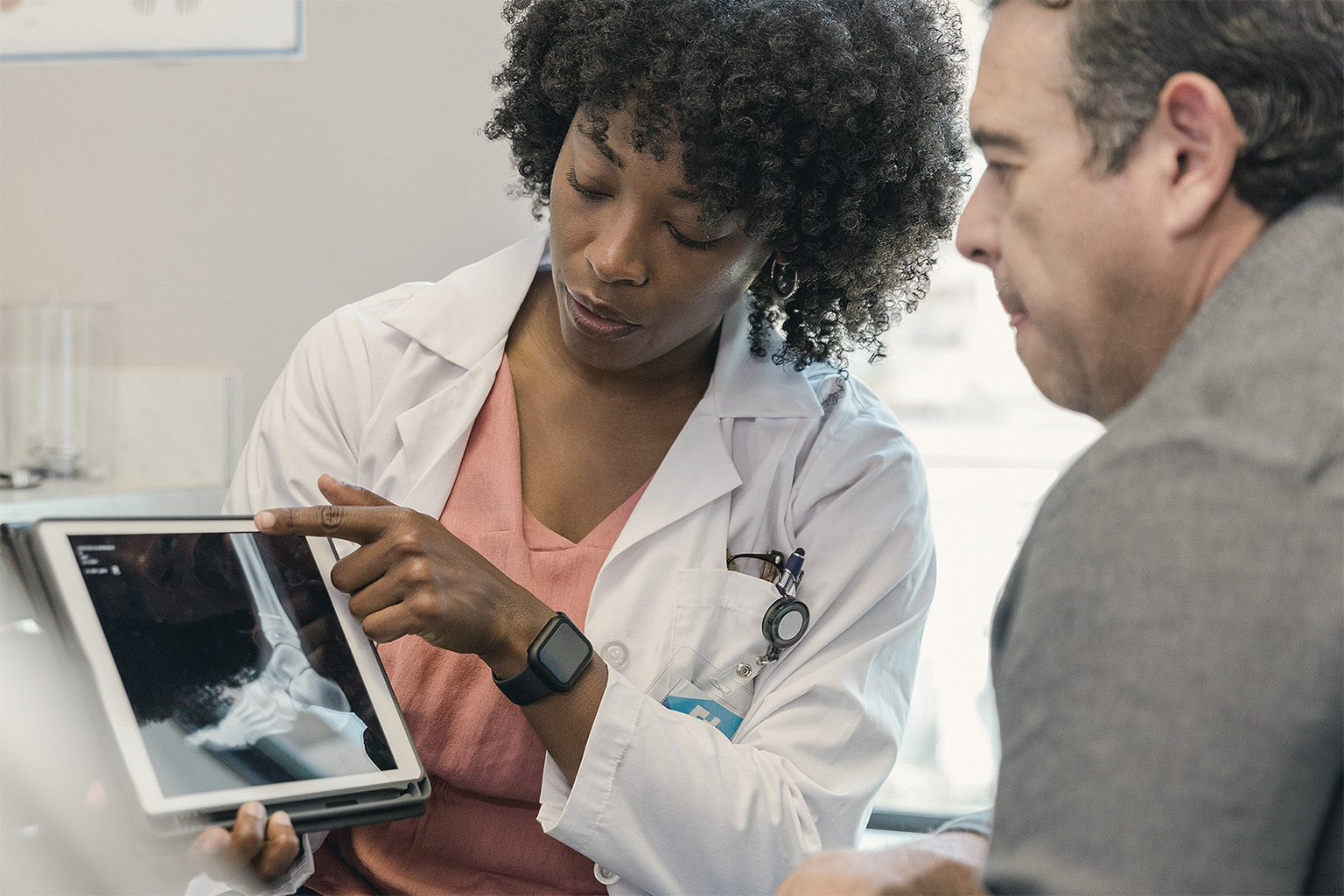 Orthopedic surgeon explaining foot X-ray