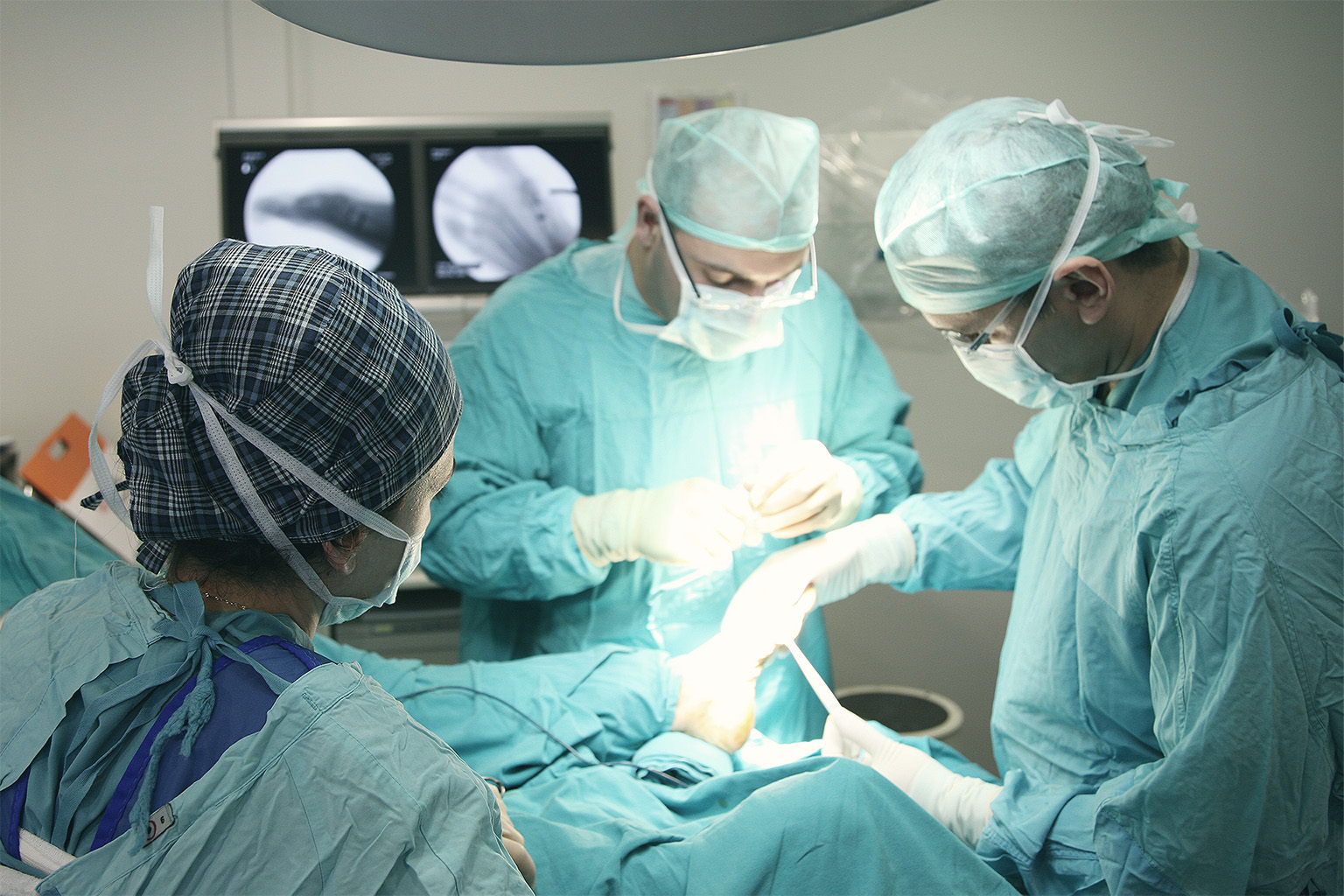 Doctors performing surgery